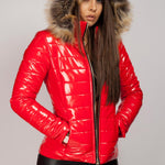 Zwarte Glanzende Dames Pufferjack met Faux Fur Capuchon: Warm, Winddicht en Modieus